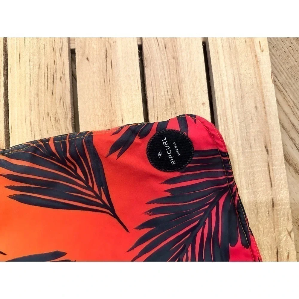 Rip Curl board shorts, boys size 26, tropical